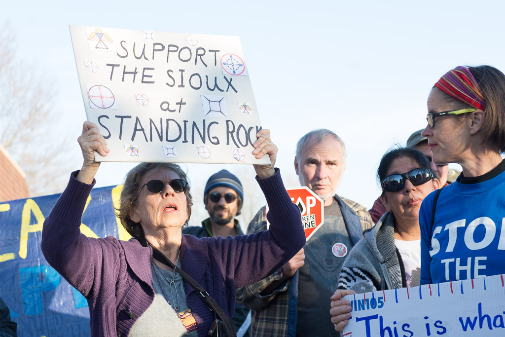 Nancy Jean Smith shows her support for the indigenous people affected by the pipeline on Tuesday, Nov. 15, 2016. -- photo by Zak Neumann