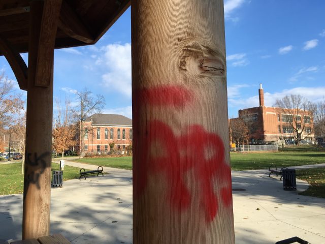 The pillars of and picnic tables beneath the main gazebo at North Market Park were vandalized with various offensive messages. -- photo by Kelli Ebensberger 
